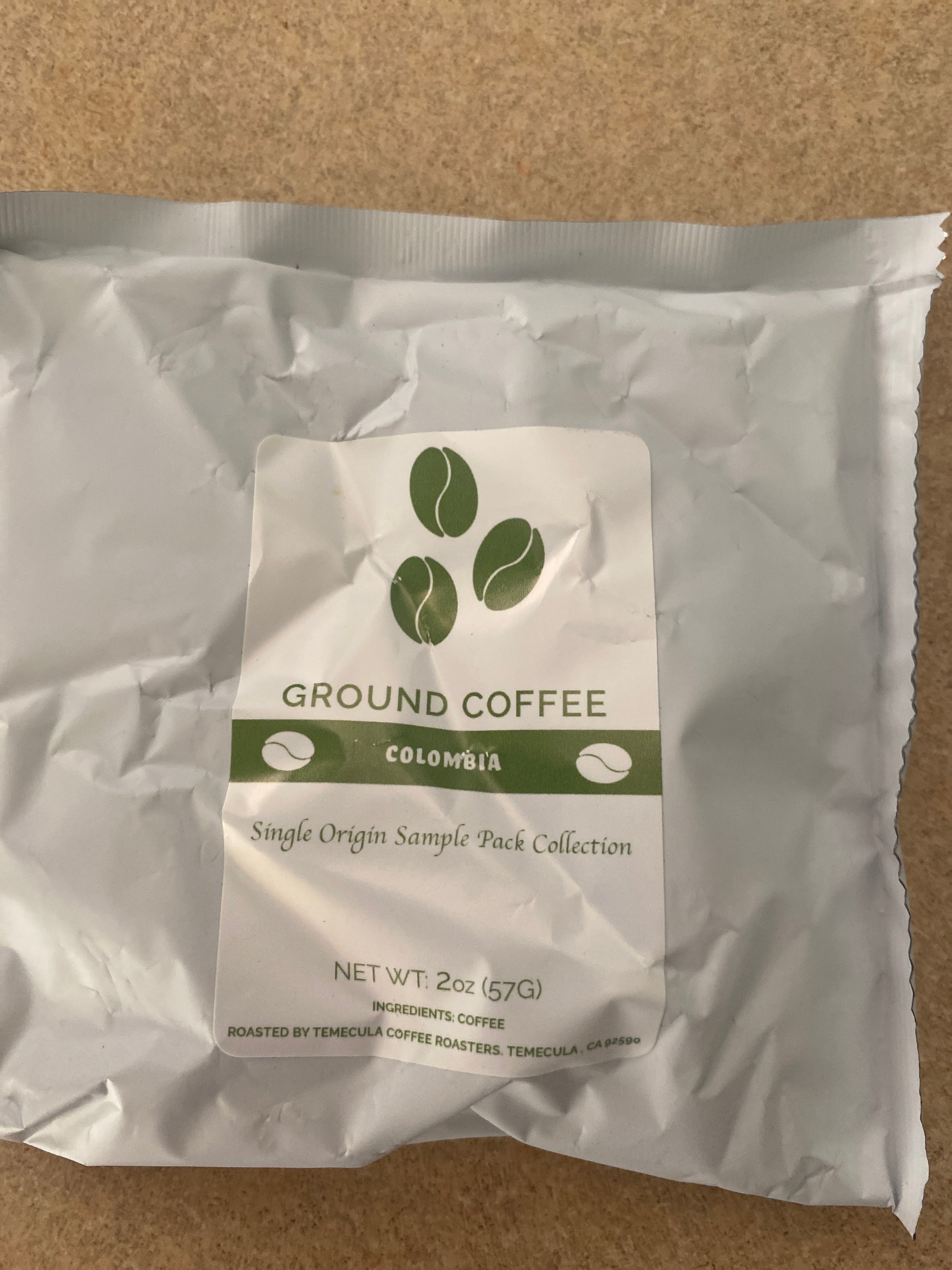 Single Origin Coffee Sample Pack featuring Ground Coffee from Colombia in 2oz packaging.