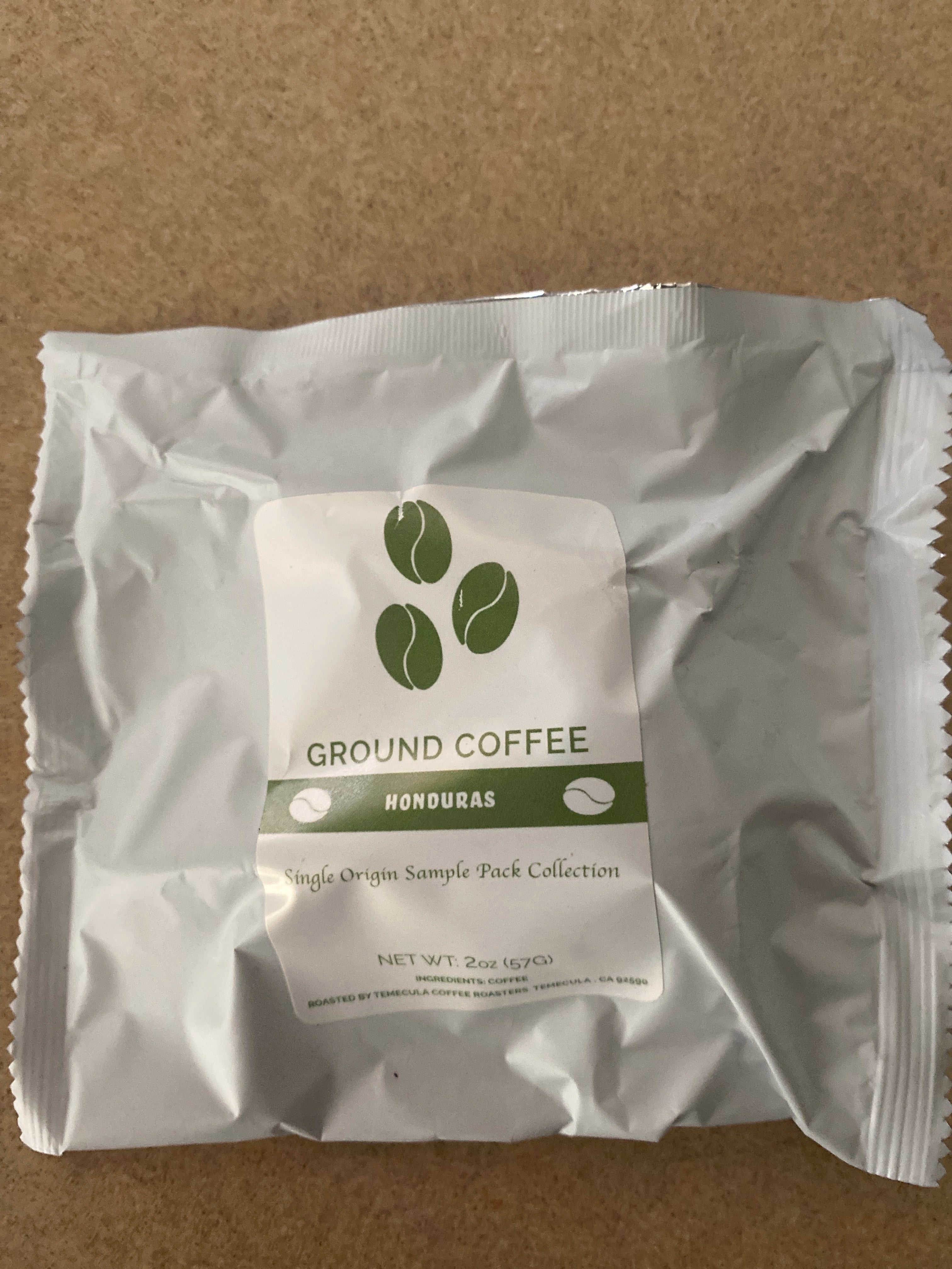 Ground coffee packet from Honduras, part of the Single Origin Coffee Sample Pack. Perfect for coffee lovers.
